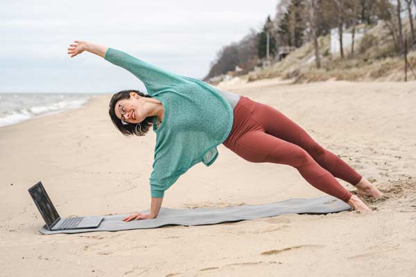 Yoga teacher Carli Watson doing online somatic yoga for emotional release