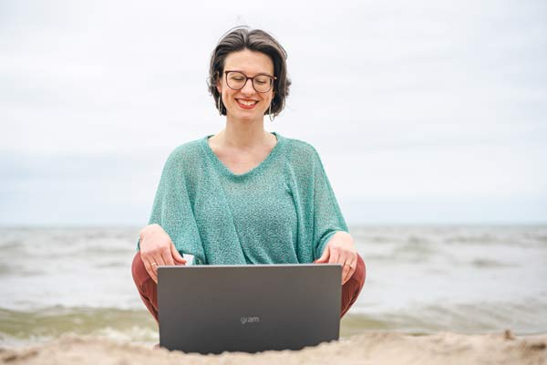 Somatic therapy grand rapids mi Carli Watson does online therapy on laptop